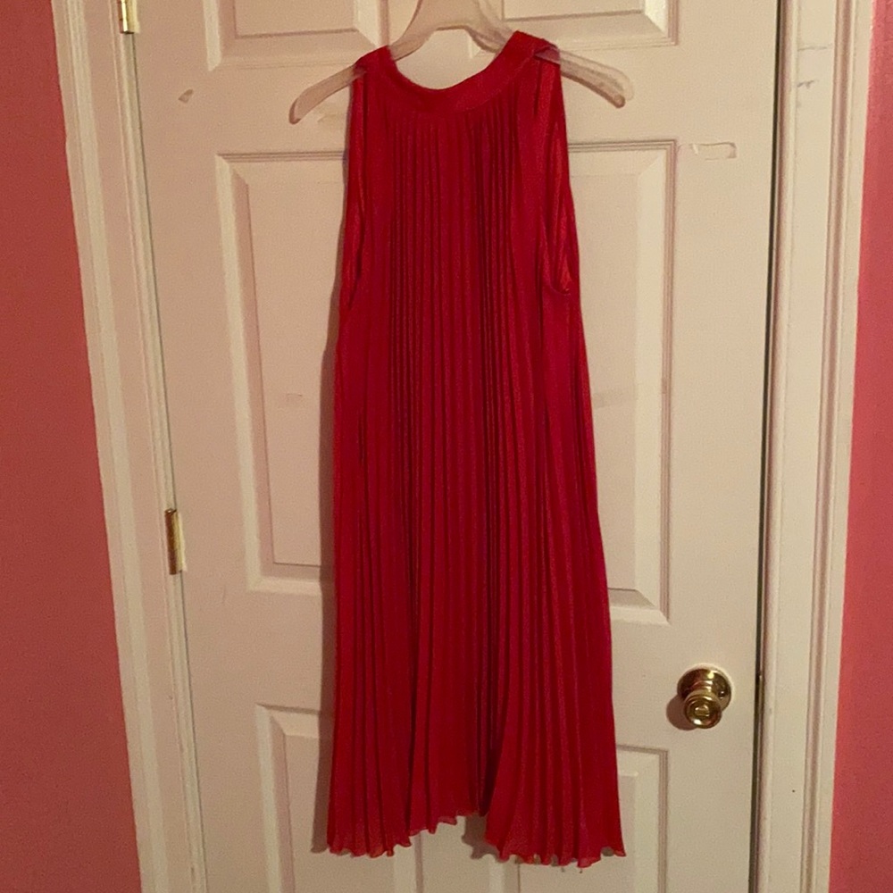 Red pleated lined sleeveless dress
